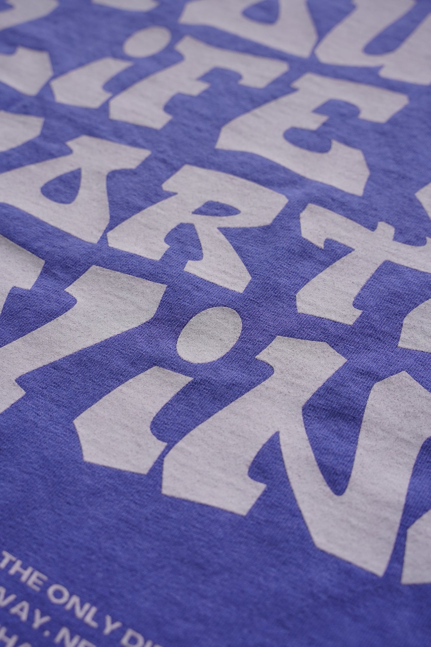 YOUR LIFE IS WORTH LIVING HEAVYWEIGHT TEE - NEON PURPLE