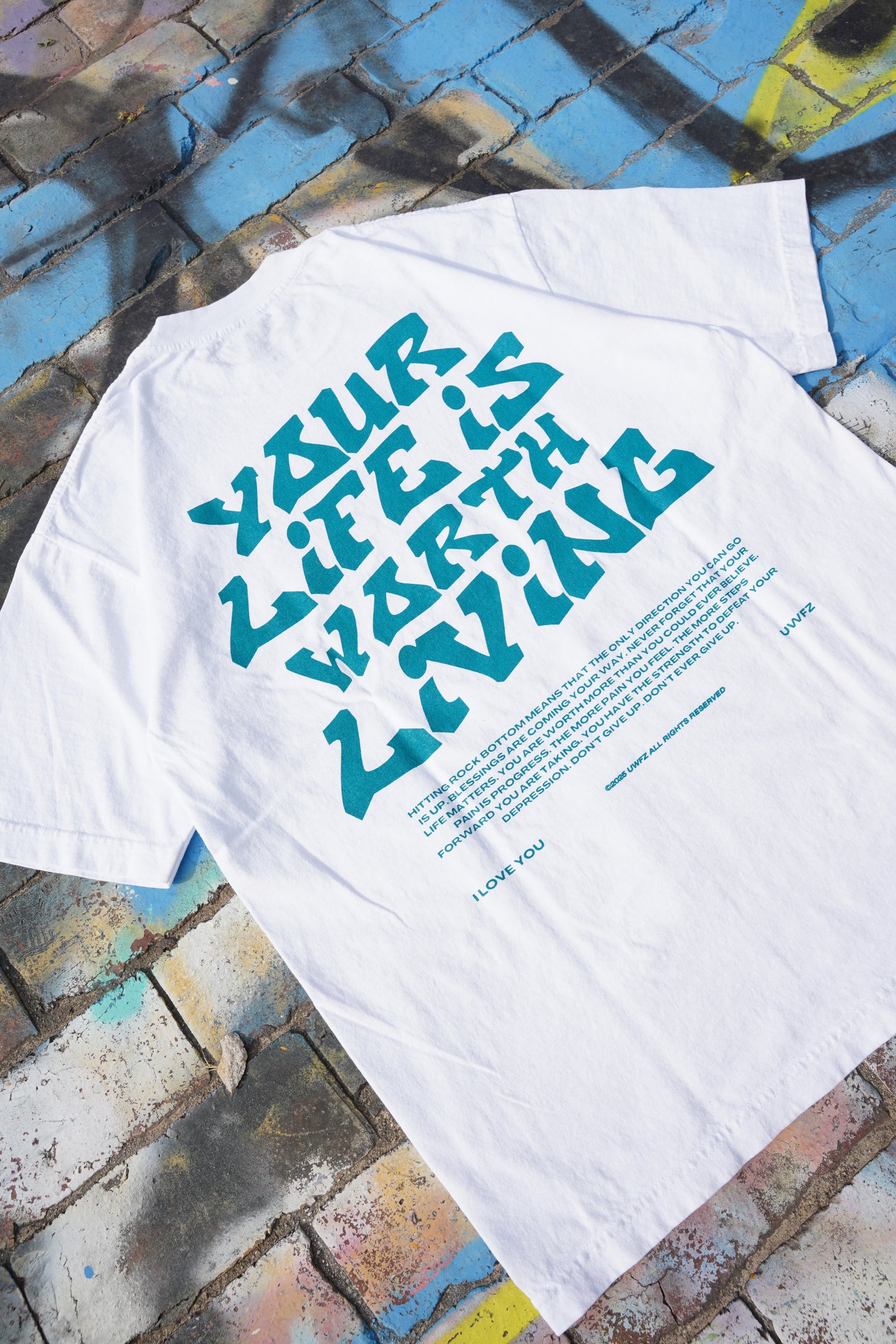 White + Teal "YOUR LIFE IS WORTH LIVING" Heavy Weight T-Shirt