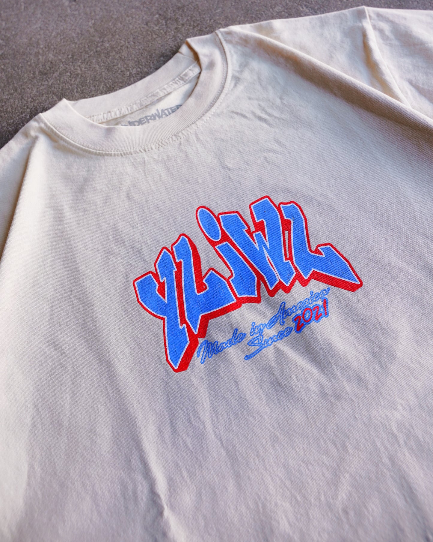 Cream "MADE IN AMERICA" YLWIL T-Shirt