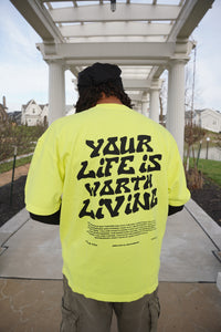 YOUR LIFE IS WORTH LIVING HEAVYWEIGHT TEE - NEON YELLOW