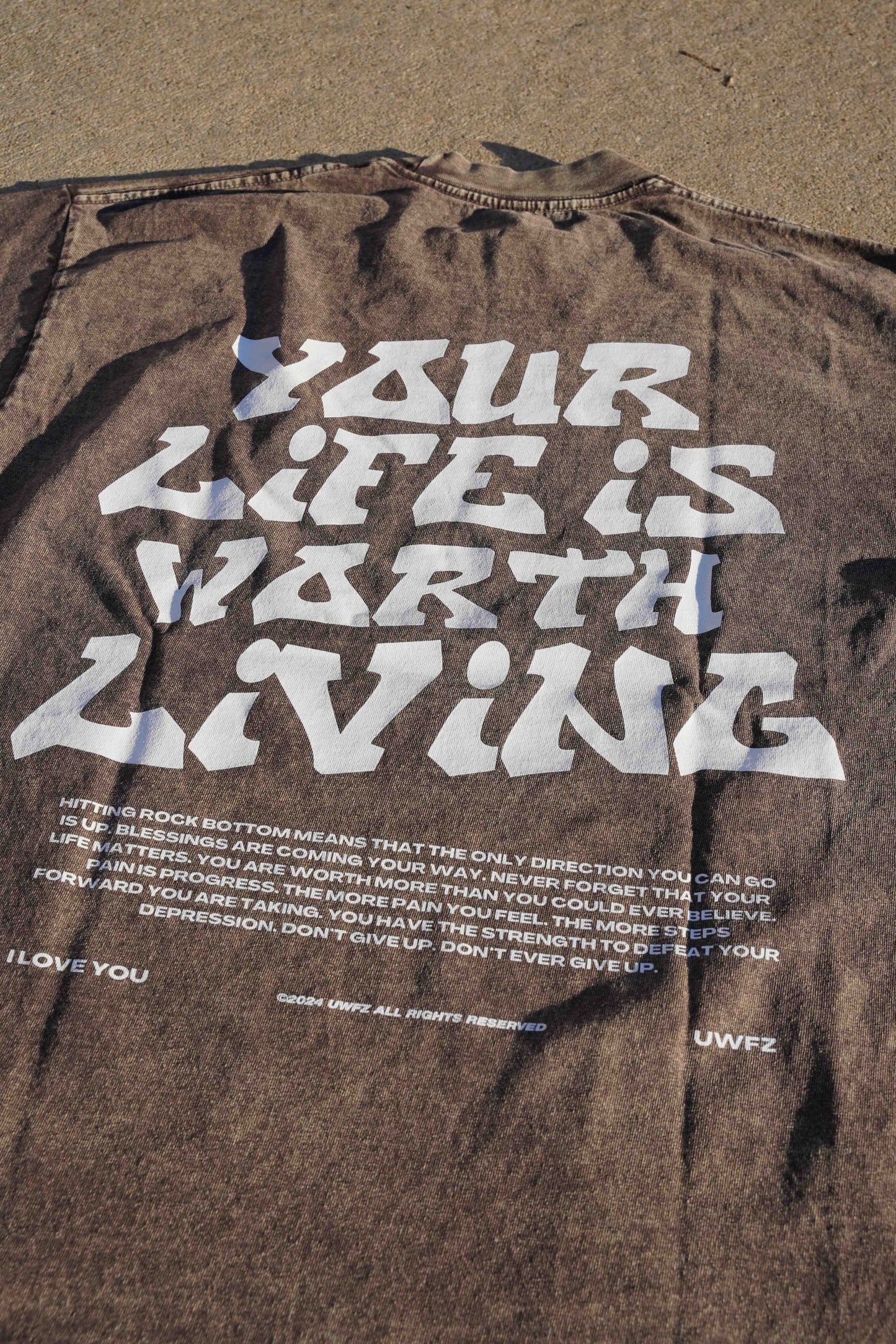 YOUR LIFE IS WORTH LIVING HEAVYWEIGHT TEE - Brown Mineral Wash