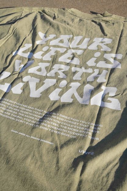 YOUR LIFE IS WORTH LIVING HEAVYWEIGHT TEE - Green Mineral Wash